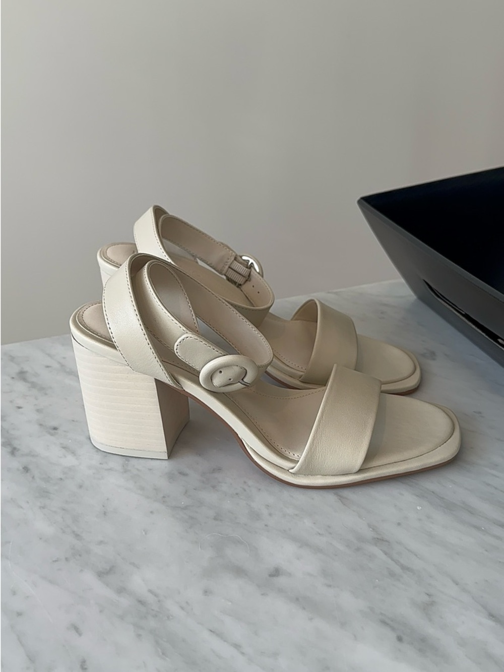 D’amelio cream heel sandals with round buckle ankle strap